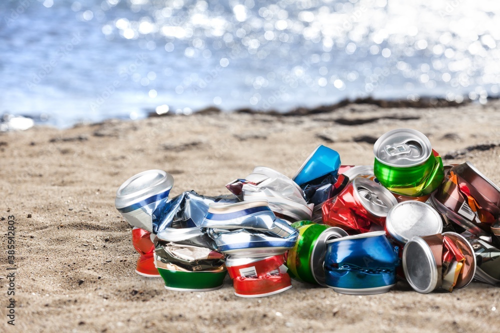 Crushed colored metal beverage cans