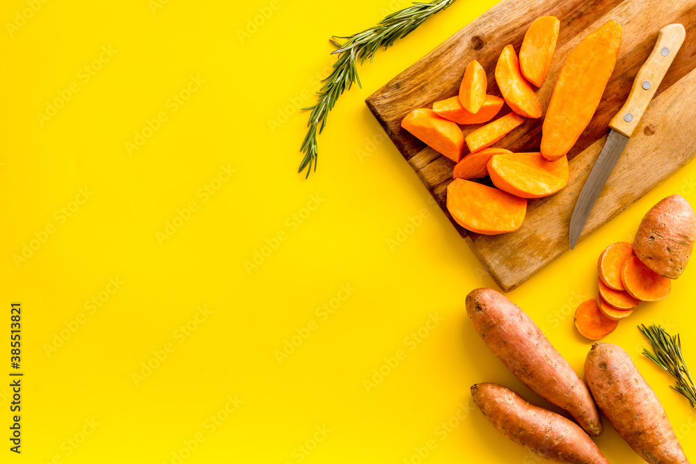 Raw sliced sweet potatoes - organic vegetables, top view