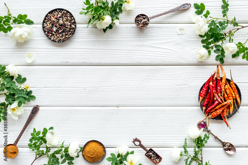 Red hot pepper and paprika - cooking utensils and spices, top view