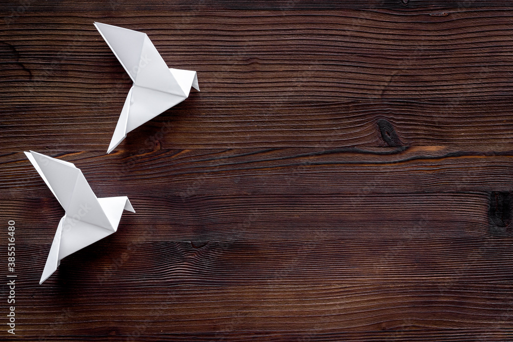 Origami birds are flying, overhead top view