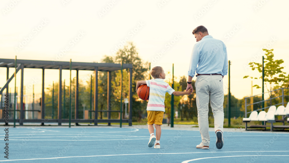 Father and son on the basketball court