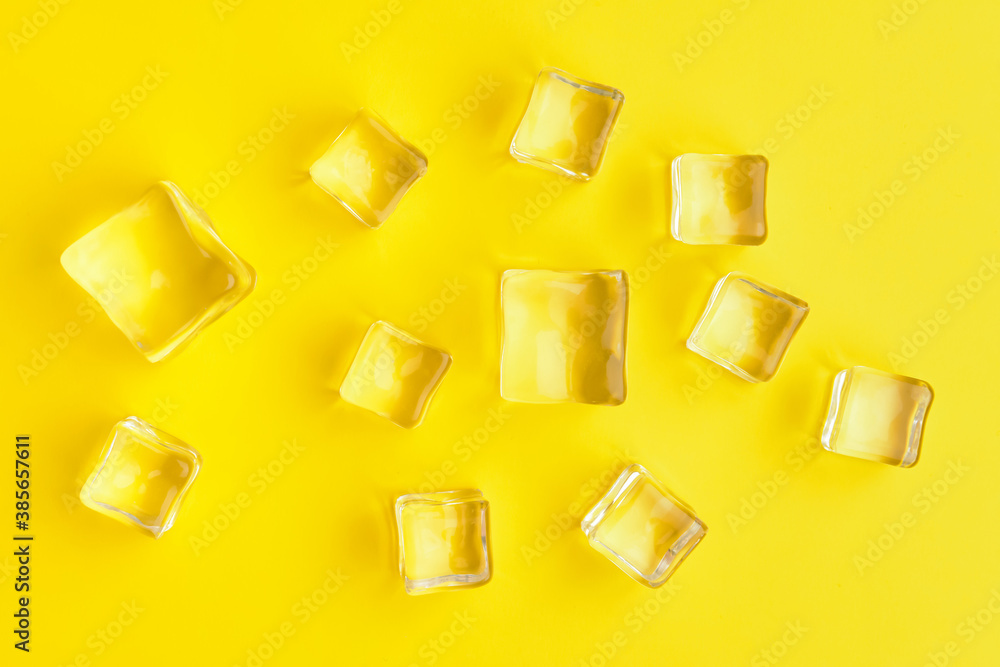 Ice cubes on color background