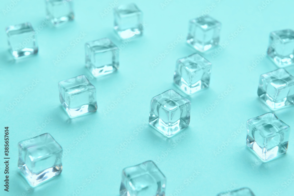 Ice cubes on color background