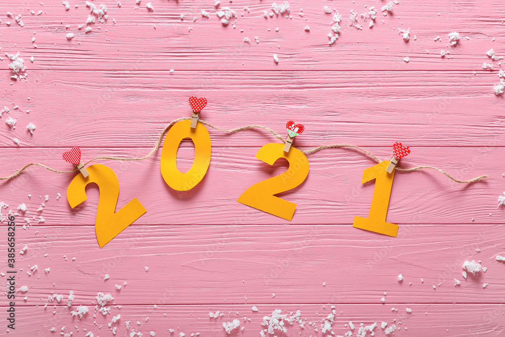 New Year composition with figure 2021 on color background