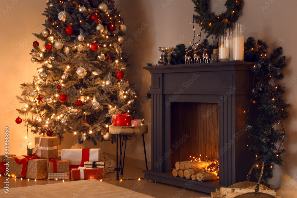 Decorated fireplace in interior of room on Christmas eve