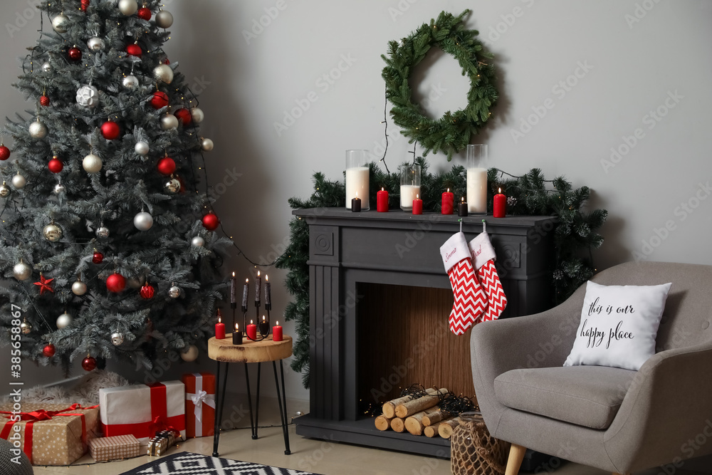 Decorated fireplace in interior of room on Christmas eve