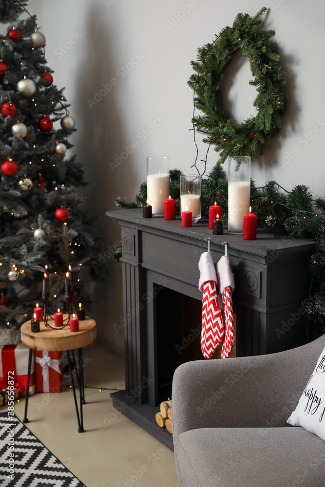 Decorated fireplace in interior of room on Christmas eve