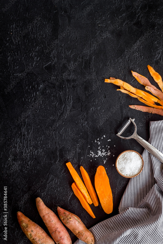 Sliced sweet potato on kitchet table, top view