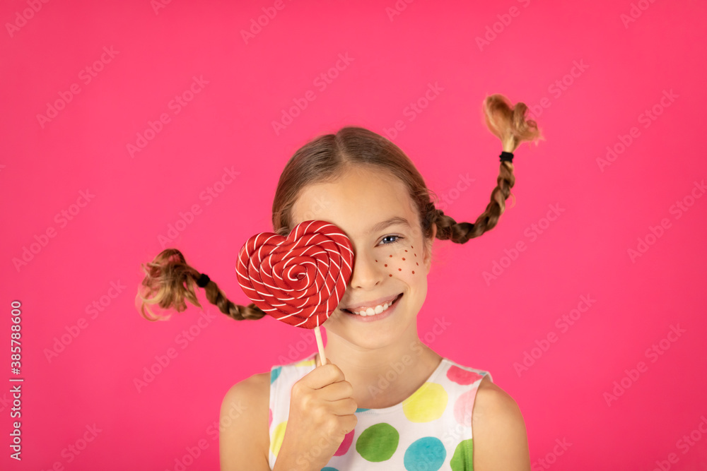 Happy girl against pink background