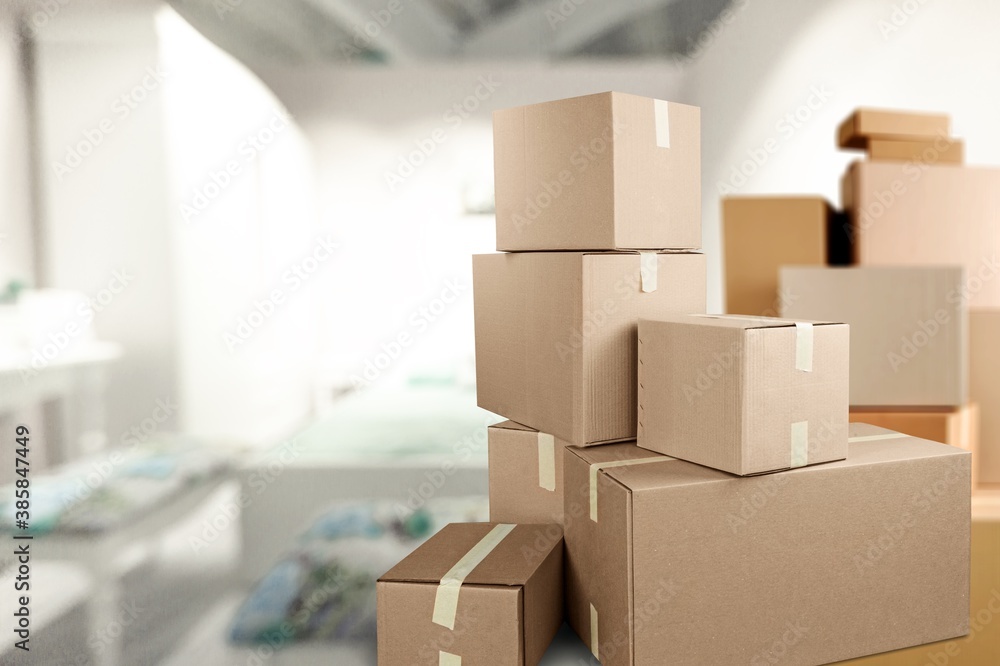 Stack of classic cardboard boxes in room