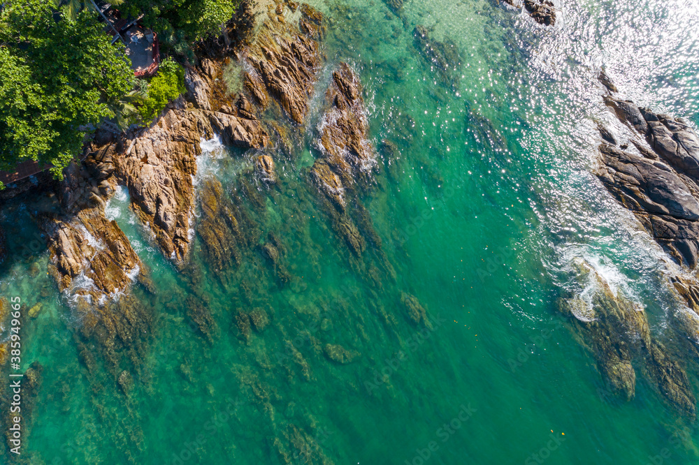 Aerial view of crashing waves on rocks landscape nature view and Beautiful tropical sea with Sea coa