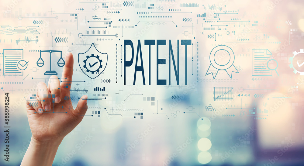 Patent concept with hand pressing a button on a technology screen