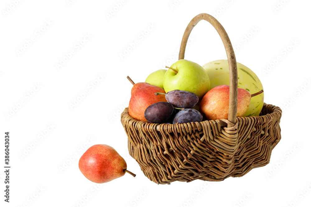 Basket with fruits isolated on white