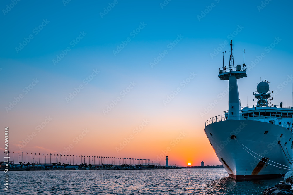 White lighthouse and urban architecture landscape night view