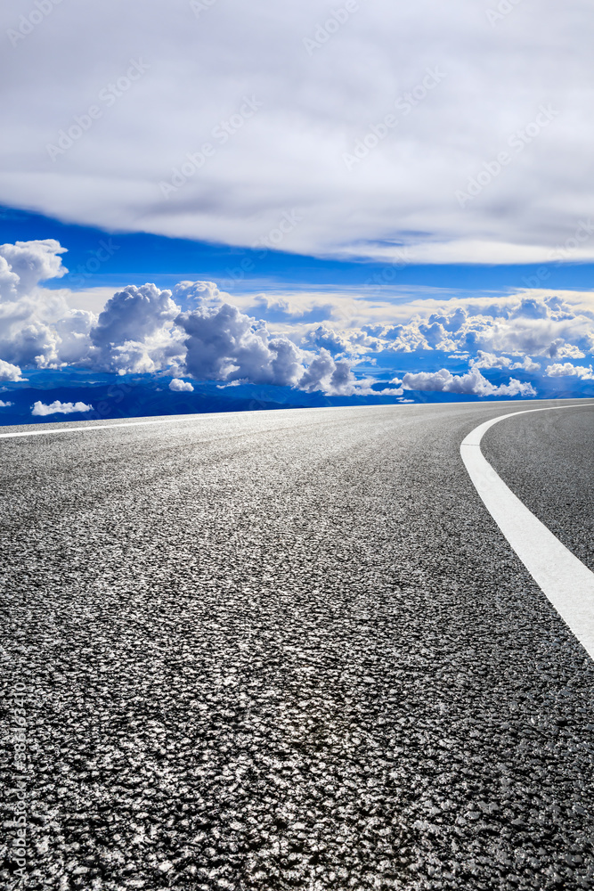 New asphalt road and mountain with sky cloud natural scenery.