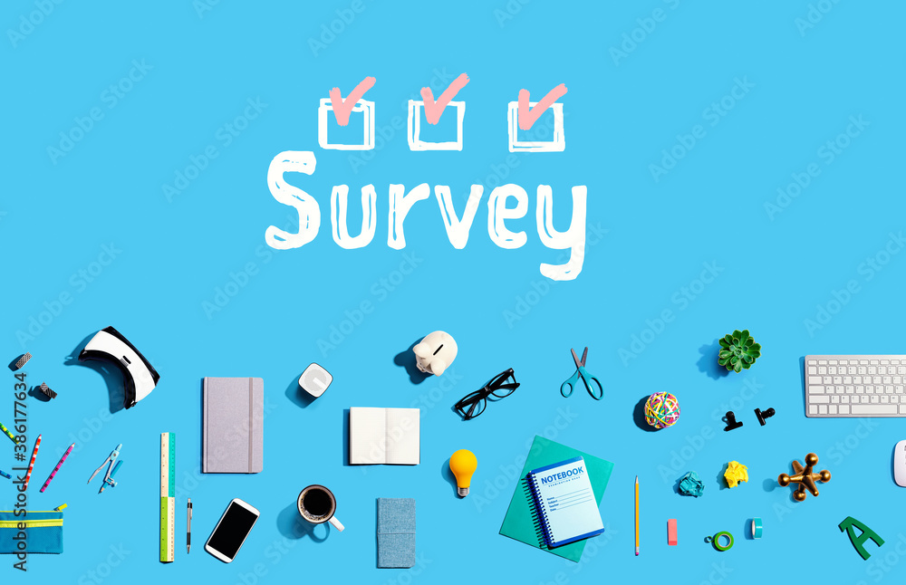 Survey with collection of electronic gadgets and office supplies