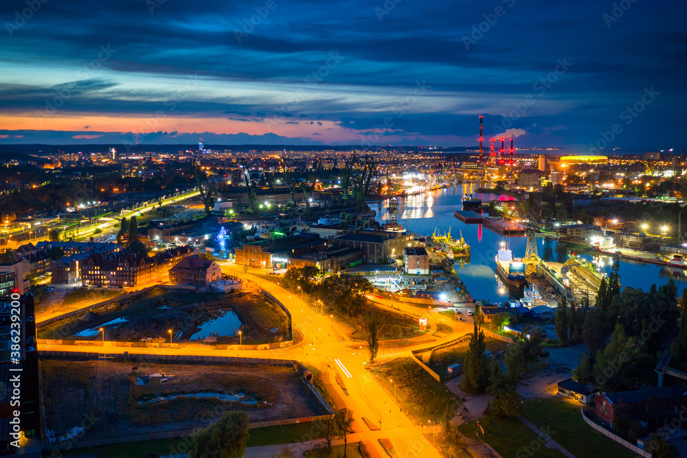 Amazing scenery of the shipyard and canals of Gdansk at dusk. Poland