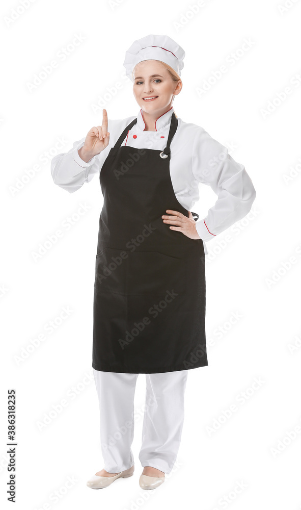 Mature female chef with raised index finger on white background