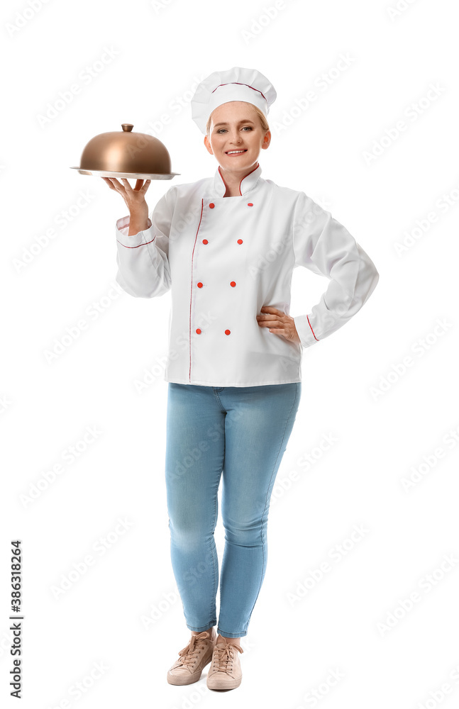 Mature female chef with tray and cloche on white background