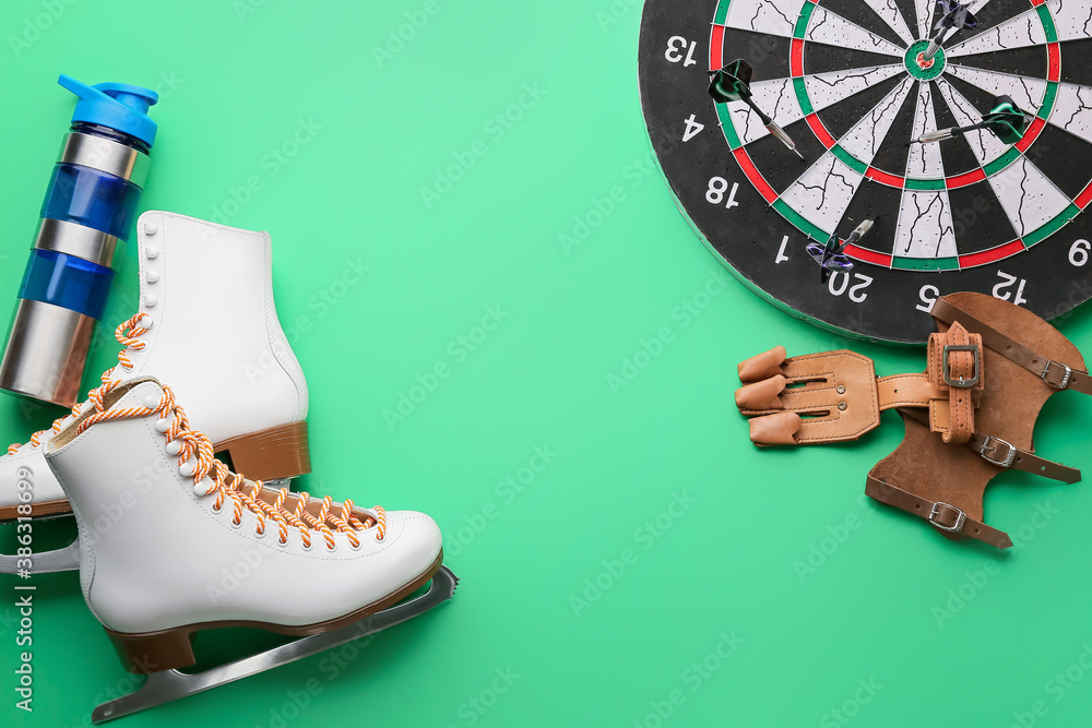 Set of sport equipment on color background