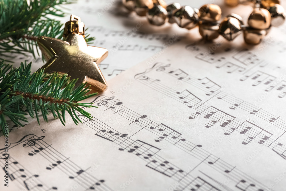 Note sheets and Christmas decor on table, closeup