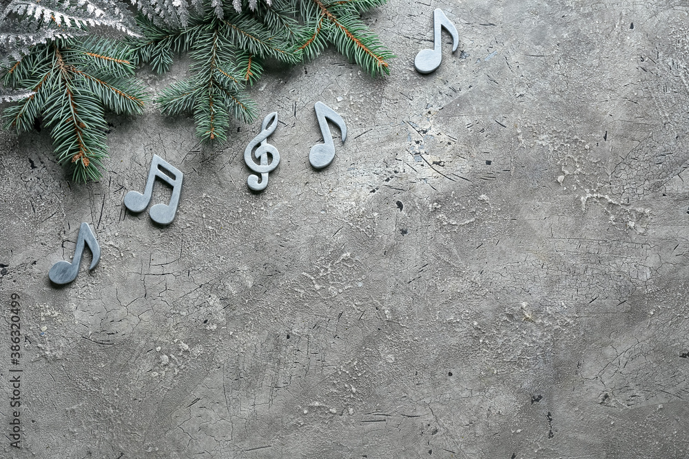 Notes and Christmas decor on grey background