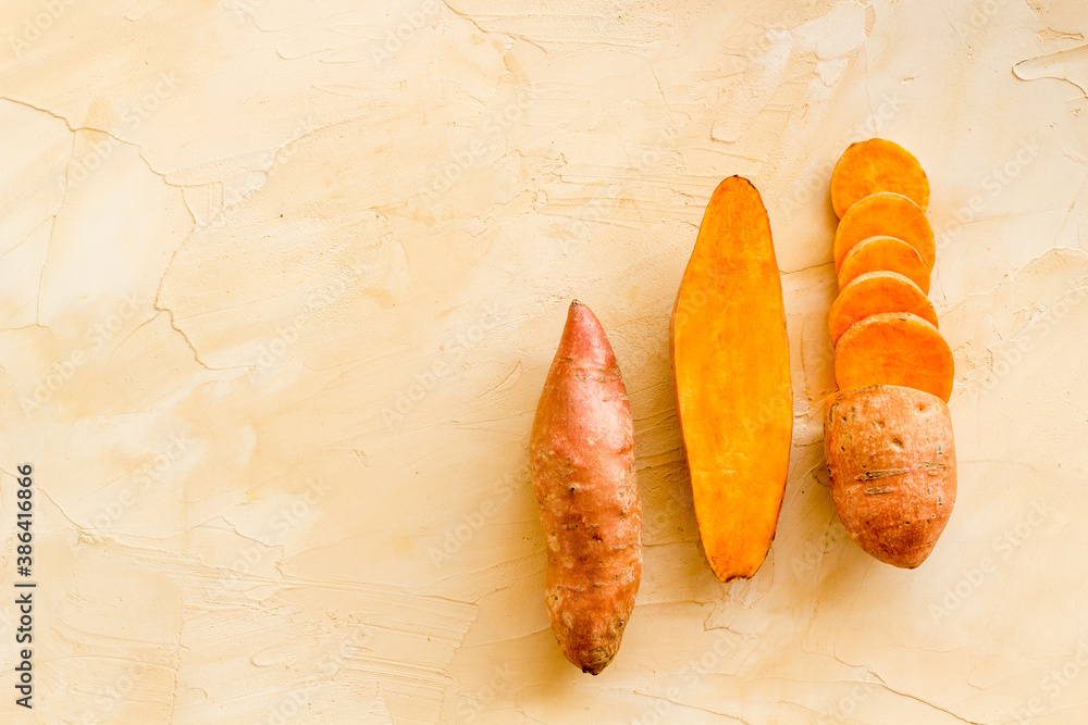 Sliced sweet potato on kitchet table, top view