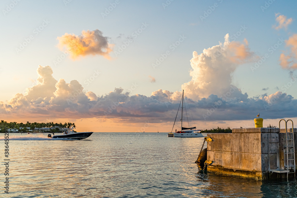 Sunset, view of Sunset y Island from Mallory Square, Key West, Florida, US