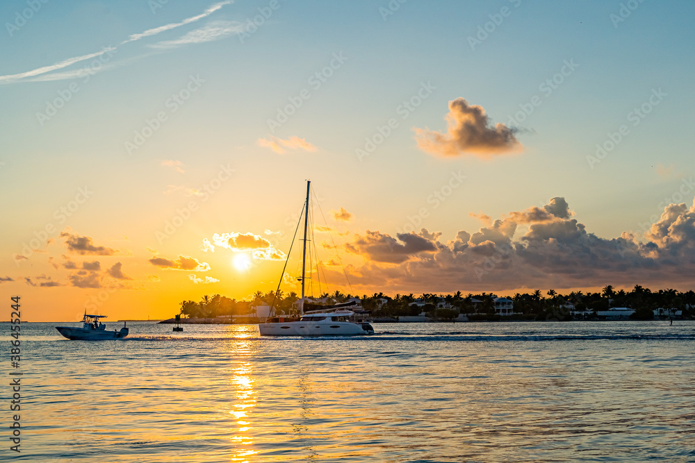 Sunset, view of Sunset y Island from Mallory Square, Key West, Florida, US