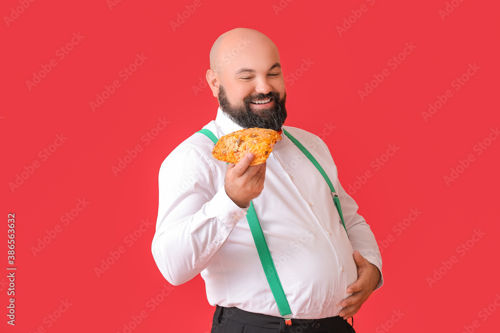 Overweight man with pizza on color background