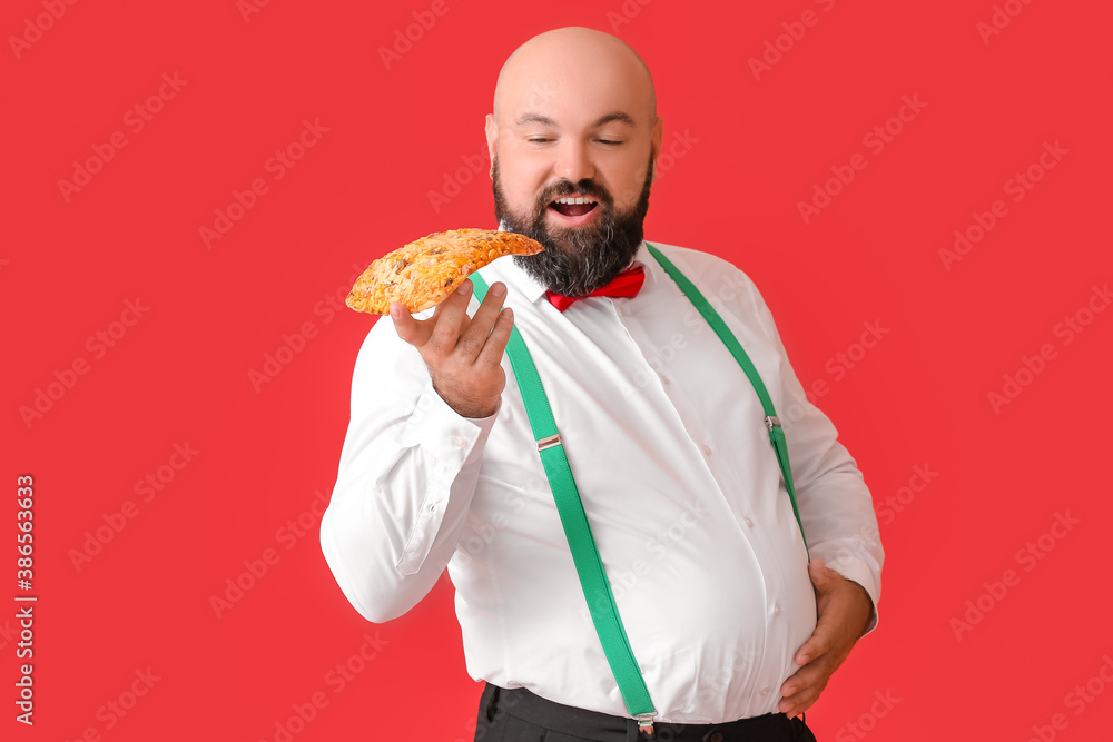 Overweight man with pizza on color background