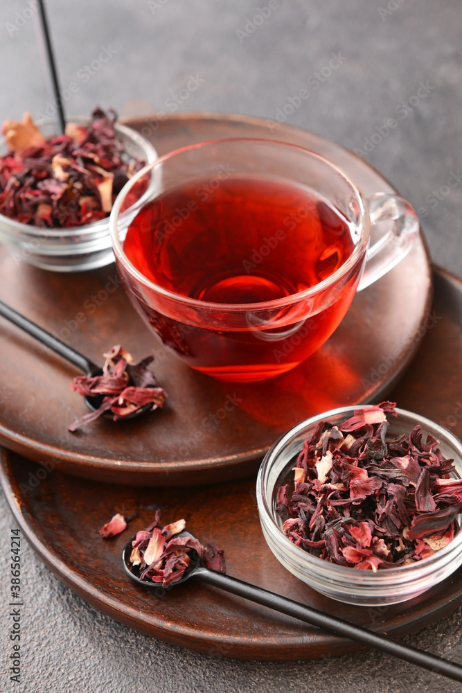 Composition with hibiscus tea on table