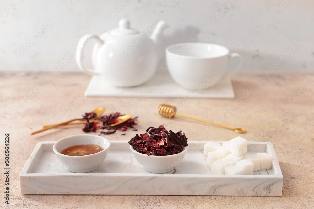 Composition with hibiscus tea on table