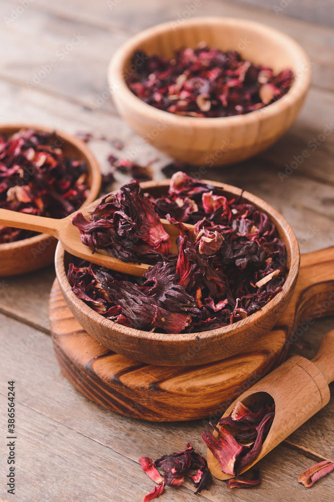 Composition with dry hibiscus tea on table