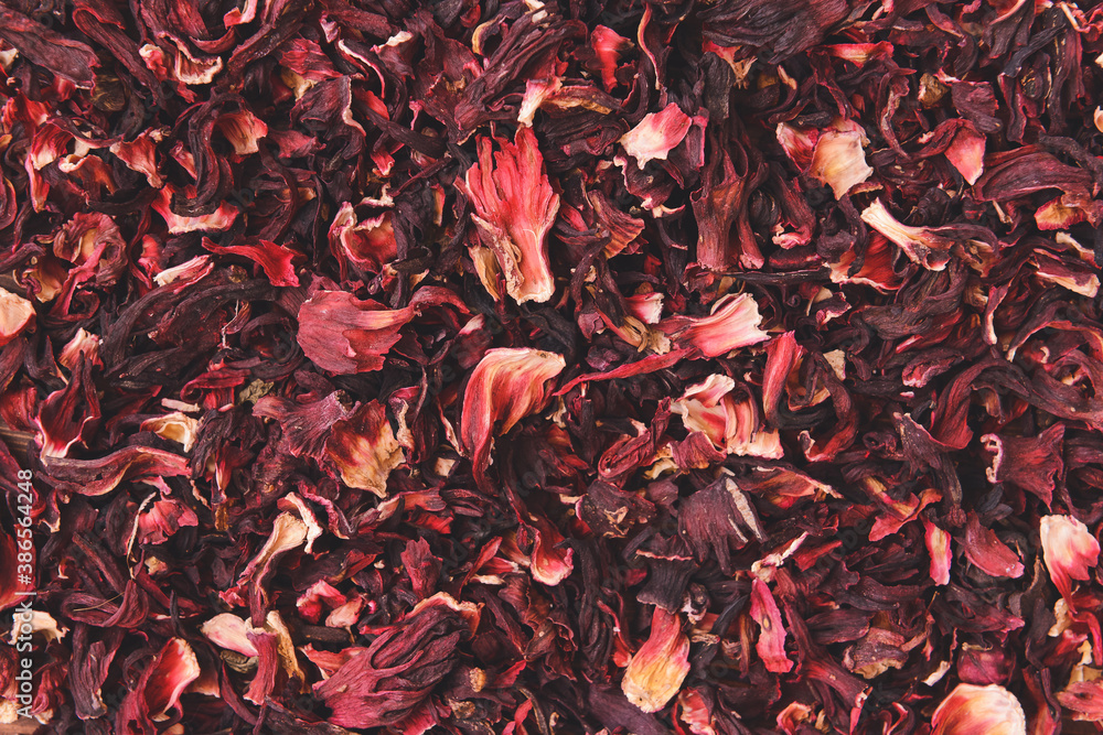 Dry hibiscus tea as background