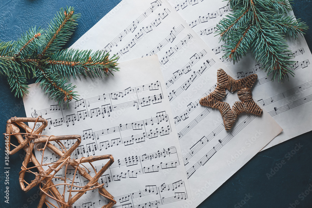 Note sheets and Christmas decor on table