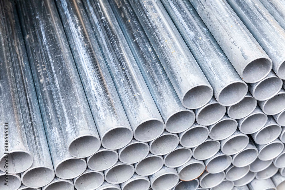 Close - up Stack of construction metal pipes