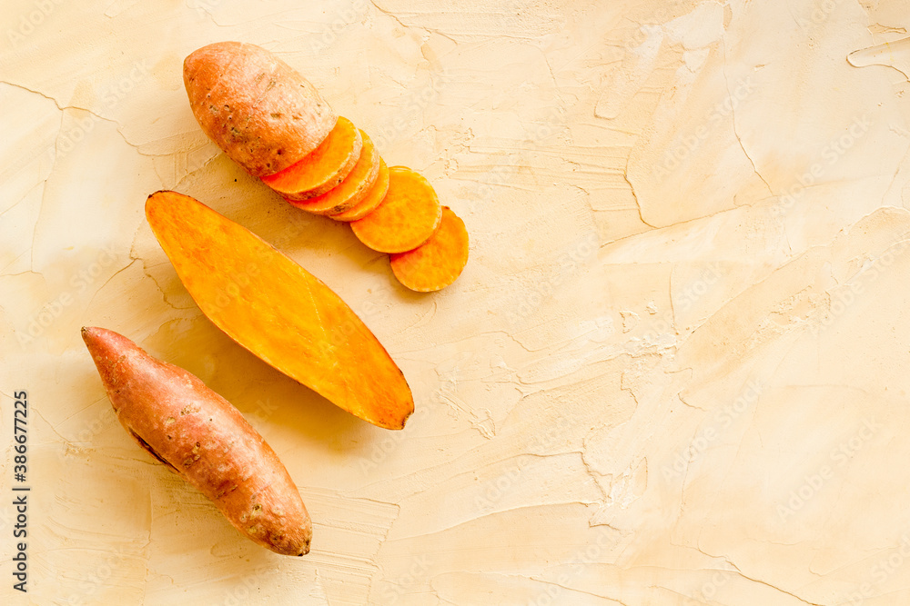 Flat lay of sweet potatoes - yams vegetables, top view