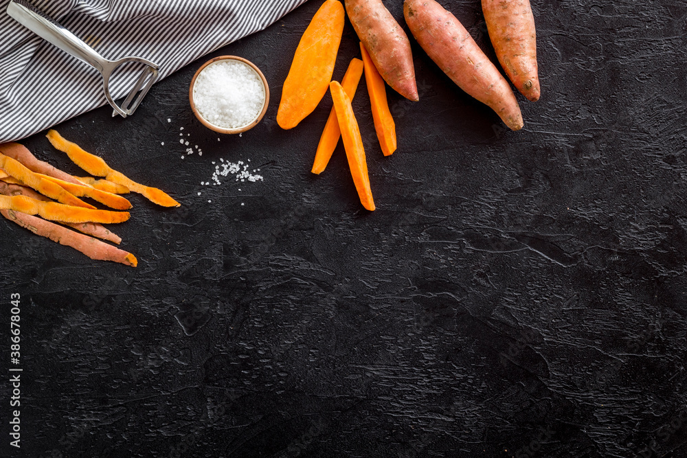 Raw sliced sweet potatoes - organic vegetables, top view