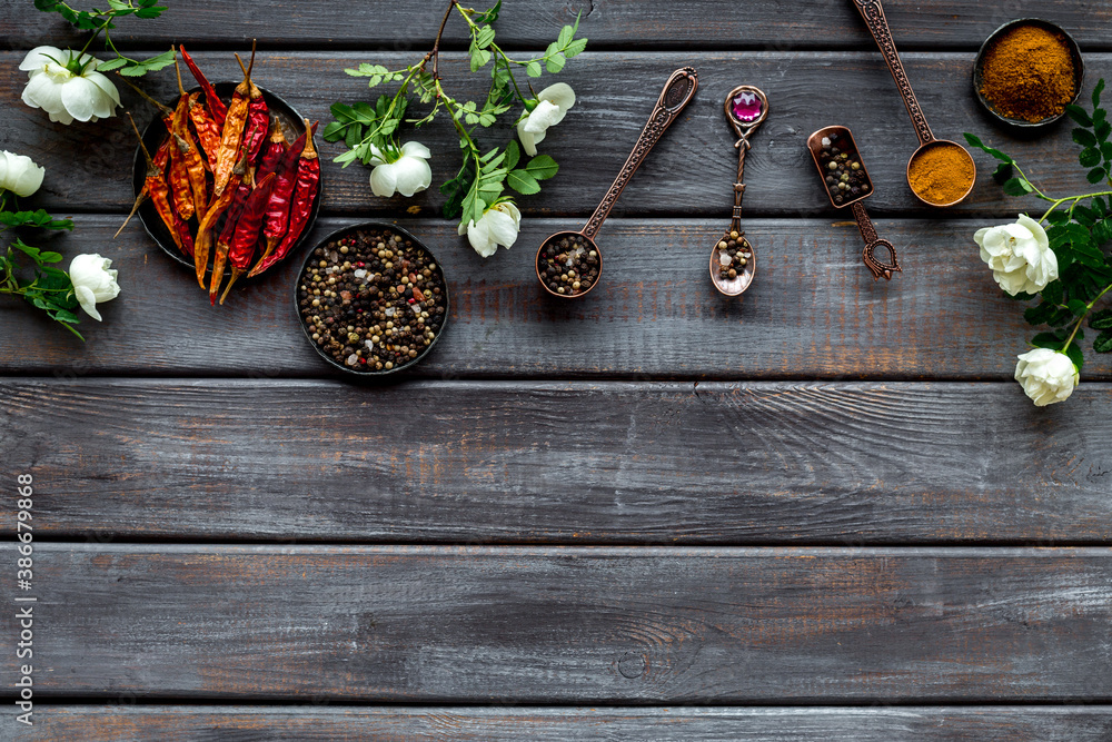 Various aromatic and hot spices with herba and flowers, view from above