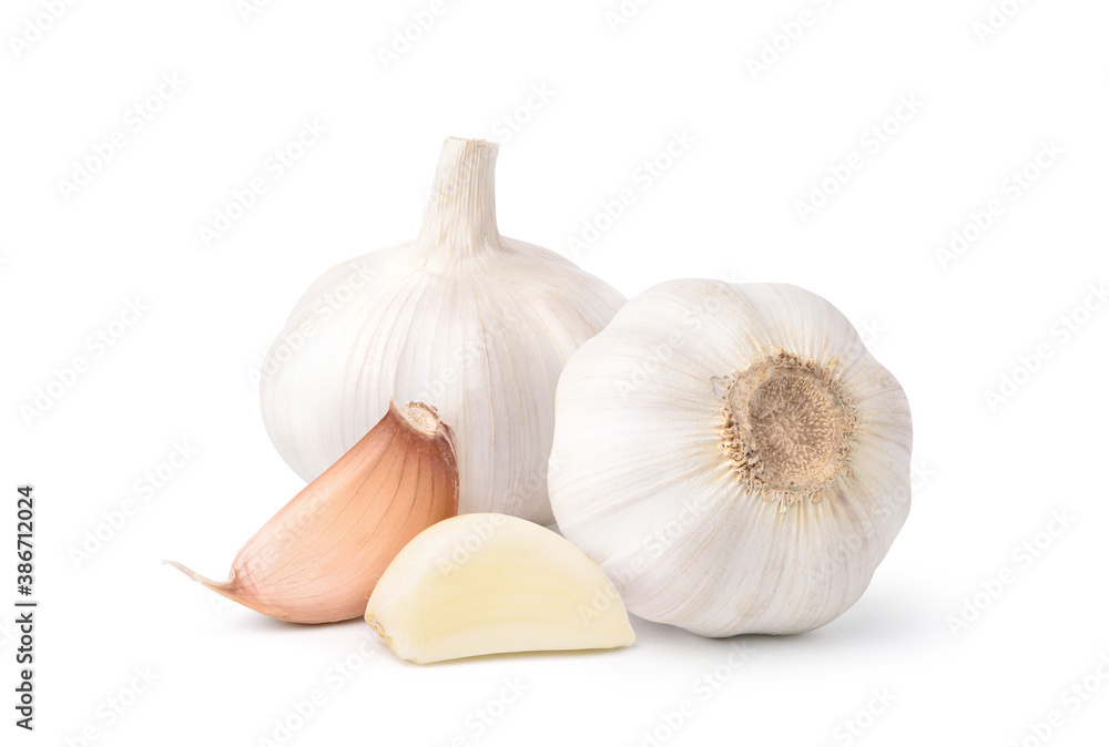 Peeled Garlic Cloves and Bulb isolated on white background.