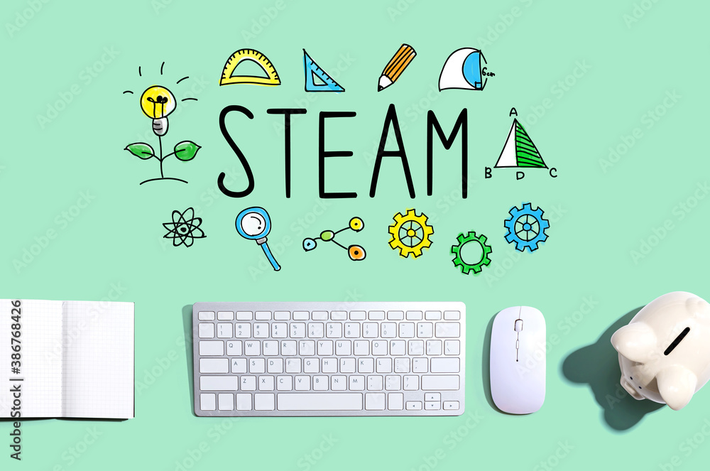 STEAM with a computer keyboard and a piggy bank