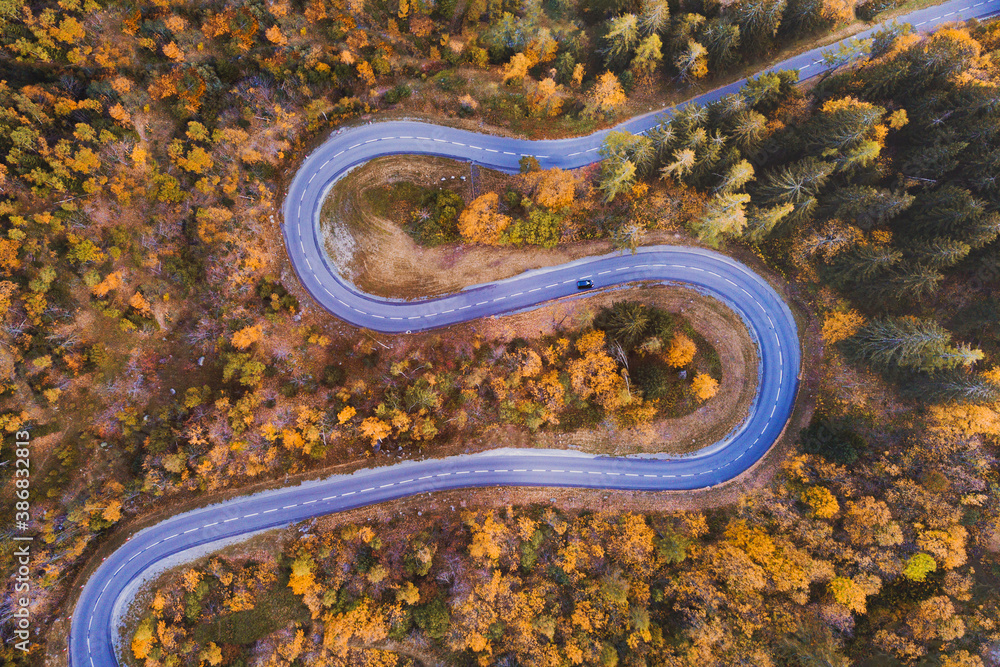 autumn, beautiful mountain road aerial landscape with fall season colors foliage, travel by car