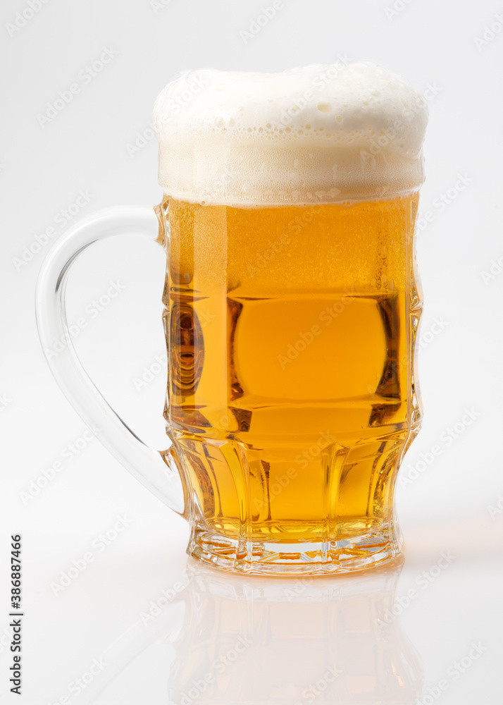 Beer in a mug on white background