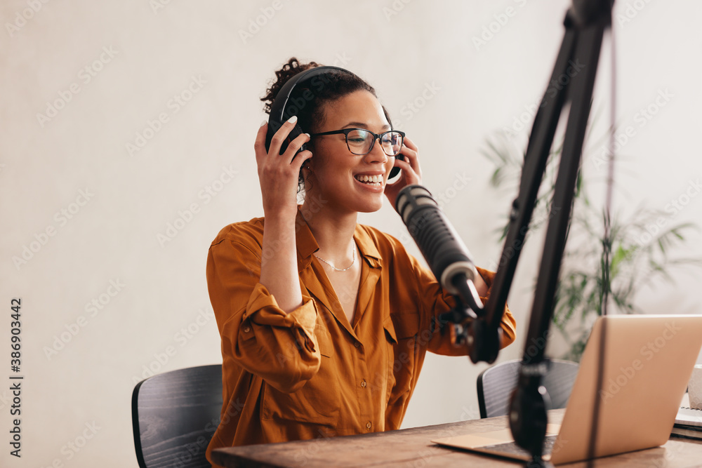 Podcaster recording her podcast from home