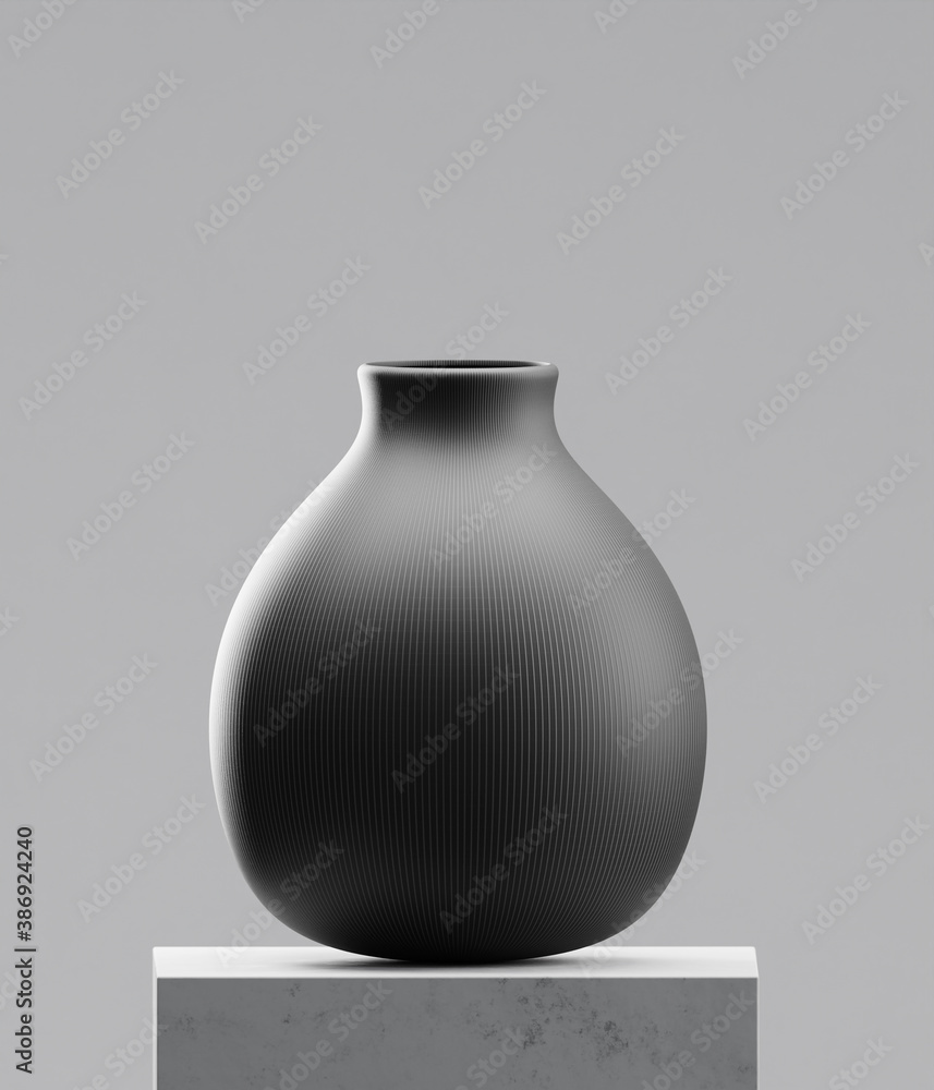 Black vase on cement table