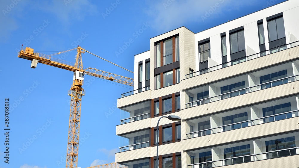 Modern and new apartment building. Multistoried modern, new and stylish living block of flats.