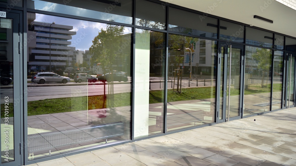 Panoramic windows of new commercial premises. Commercial property in development standard for rent.