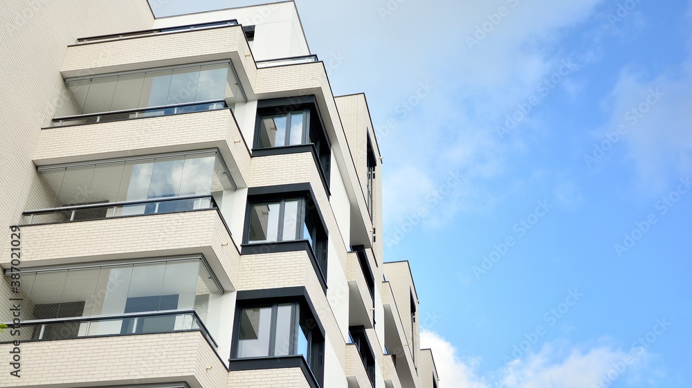 Modern and new apartment building. Multistoried modern, new and stylish living block of flats.