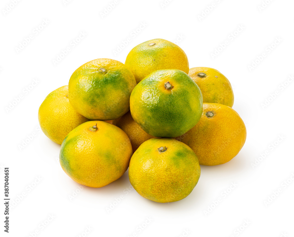 Early Japanese mandarin oranges on a white background